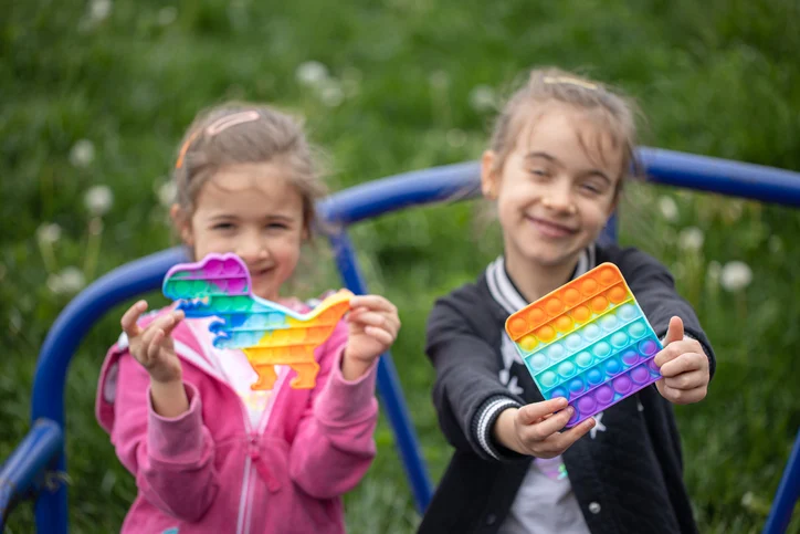 image of members collaborating on a creative project in a bright studio for a nonprofit & charity